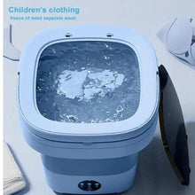 Blue top-load laundry washer with clear lid window showing water