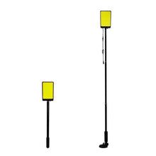 LED camping lantern with yellow square light panel on tall black stand and base