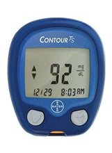 Contour TS blood glucose meter with 82 mg/dL reading on screen