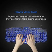 Gaming keyboard with blue backlit keys and wrist rest