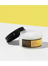 COSRX Snail 92 all-in-one cream jar with open black lid and white cream texture
