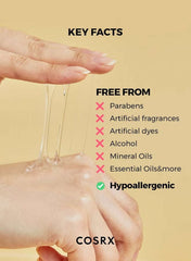 COSRX Advanced Snail 96 Mucin Power Essence applied on hand showing its smooth, viscous texture and key facts