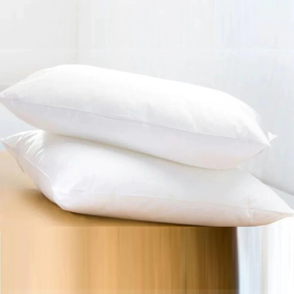 Huitich white cotton bed pillows set stacked on wooden surface for comfortable sleep