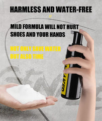 Hand holding black bottle dispensing waterless shoe cleaning foam onto another hand