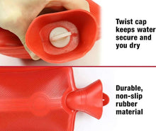 Red hot water bottle close-up showing twist cap and ridged rubber body