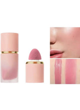 Cream blush tube with gold cap and applicator sponge, pink swatch on skin