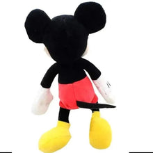 Plush Mickey Mouse toy standing with red shorts and large yellow shoes