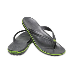 Comfortable Crocs slip on shoes in black with green trim designed for casual wear and support