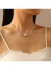 Huitich crystal rectangle pendant necklace with sparkling stones on a delicate chain worn by a model