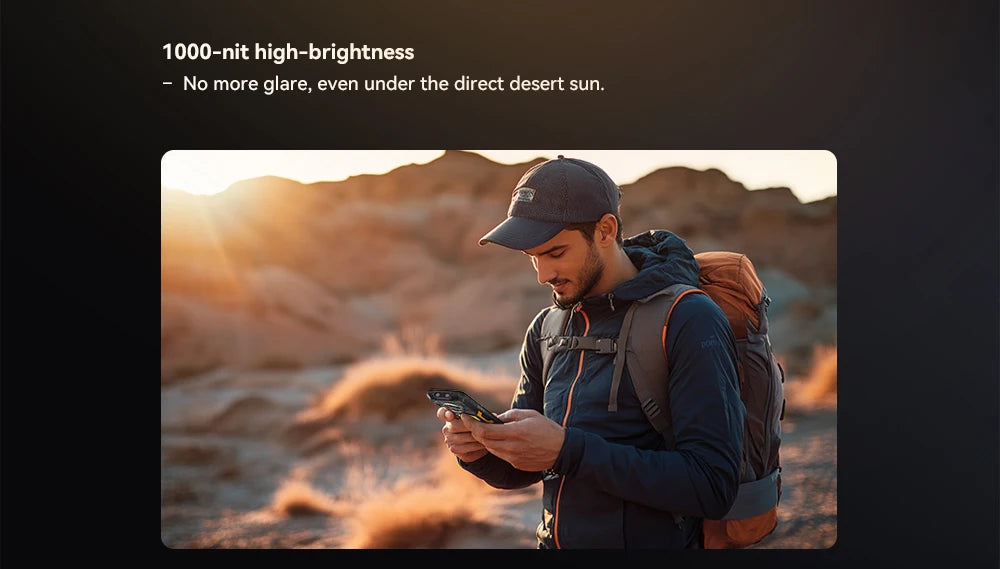 Cubot King Kong Power 5 Android 15 smartphone in hiker hands outdoors with 1000 nit bright screen in desert sun