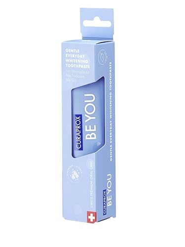 Light blue boxed tube of Curaprox Be You gentle whitening toothpaste with Swiss branding and gentle whitening claim