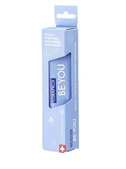 Light blue boxed tube of Curaprox Be You gentle whitening toothpaste with Swiss branding and gentle whitening claim