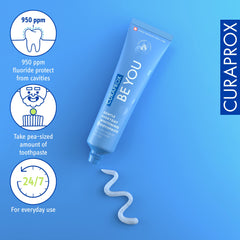 Blue Curaprox Be You gentle whitening toothpaste tube on blue background with swirled paste and usage icons