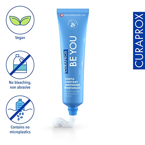 Curaprox Be You gentle whitening toothpaste. Blue tube with speckled white paste and vegan no microplastics icons