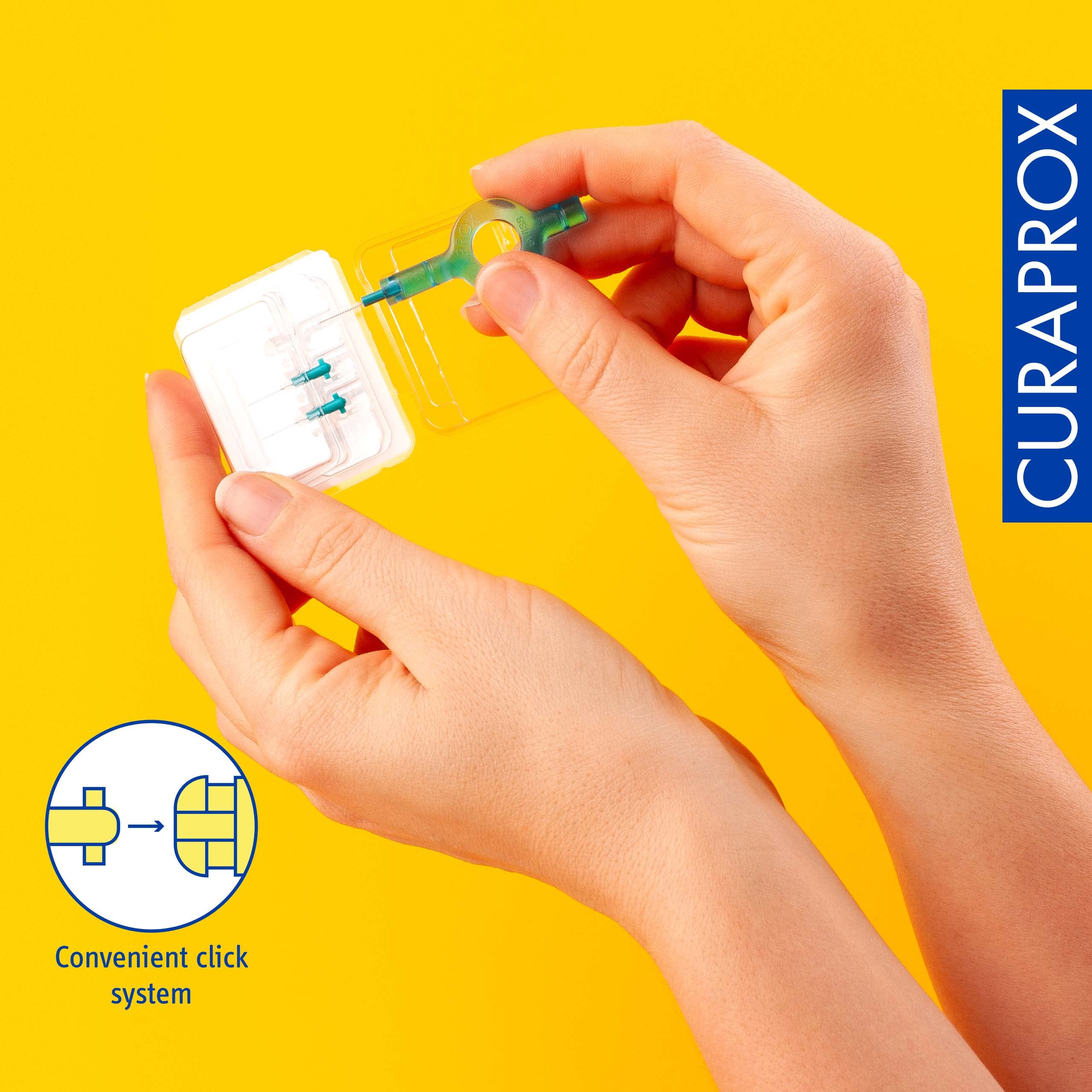 Curaprox interdental brushes starter set shown in hands with clear case and convenient click system