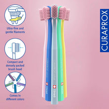 Curaprox CS 12460 toothbrush set, blue, green, and yellow handles with dense bristle heads