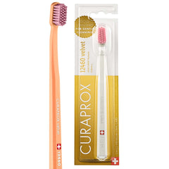 Curaprox peach and packaged white toothbrush displayed side by side ultra soft toothbrush for sensitive gums
