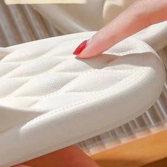 Close-up of soft cushioned sole of Huitich cute bear slippers for women showing comfortable padding