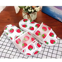 Strawberry print slide sandals, open toe, white base with red strawberry pattern and thick sole