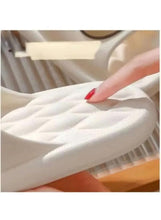 White slip-on slippers with padded quilted top and bear patch, open toe