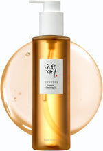 Ginseng cleansing oil bottle with amber glass and white pump dispenser