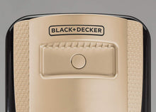 Oil radiator heater close-up with BLACK+DECKER logo and beige power knob