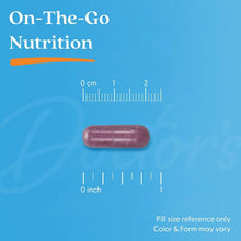 Single purple veggie capsule with size reference markings