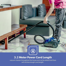 Geepas handheld vacuum cleaner with long hose and floor nozzle on tile floor