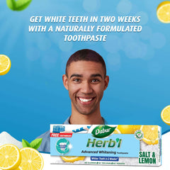 Smiling man with Dabur Herbl whitening toothpaste value pack Salt and Lemon box showing free toothbrush and lemons
