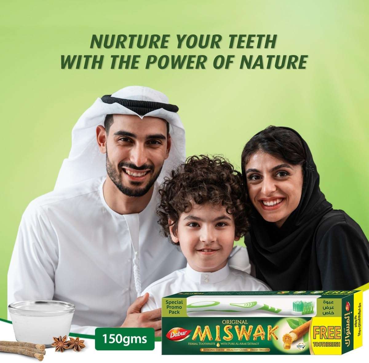 Dabur Miswak toothpaste with toothbrush shown with smiling family in traditional dress and herbal pack