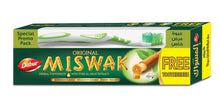 Miswak herbal toothpaste box with free toothbrush, green and yellow packaging