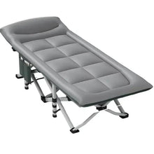 Foldable dark gray camp cot with padded quilted mattress and folding metal legs