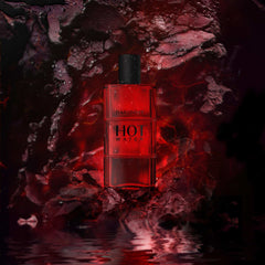 Davidoff Hot Water perfume for men in a red bottle with black cap against fiery dark background