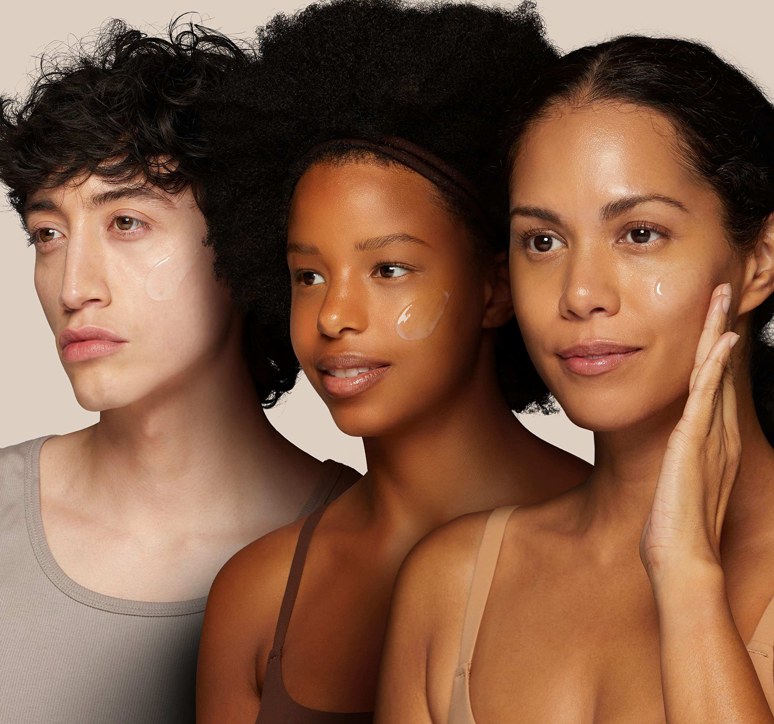 Three models showing hydration with serum dots on cheeks using The Ordinary Hyaluronic Acid UAE for glowing skin