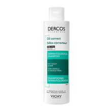 Oil correct shampoo bottle, white with teal label and Dercos cap