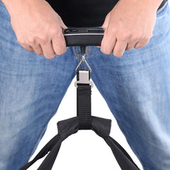 Hands holding ULTECHNOVO digital luggage scale for travel with bag strap attached for weighing