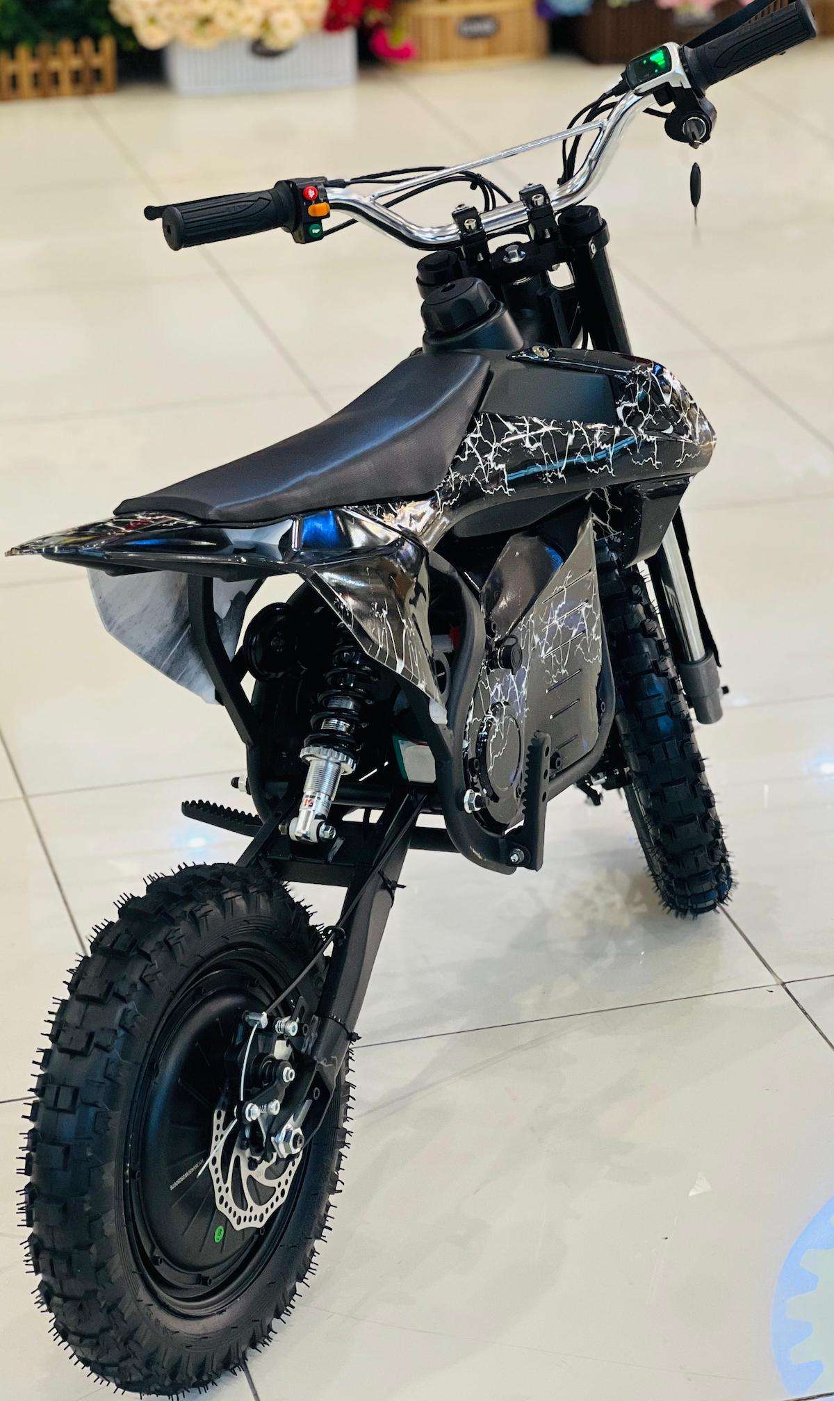 Rohan Wings black off-road electric scooter for adults with knobby tires disc brakes and motocross style seat