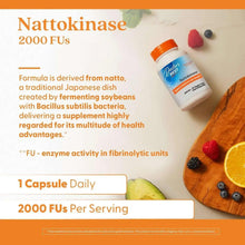 Nattokinase supplement bottle with orange cap on tabletop with fruit and berries