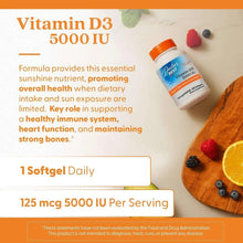 Vitamin D3 5000 IU softgel supplement bottle with orange cap on wooden surface