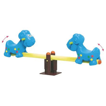 Blue dog seesaw: two colorful blue dog bodies balanced on a yellow plank over a brown post.