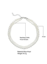 Double-layer pearl choker necklace with small silver-tone clasp at center
