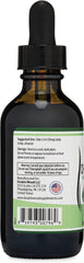 Double Wood Supplements amber glass dropper bottle showing back label with usage instructions and chlorophyll liquid drops