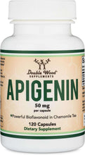 Double Wood Apigenin dietary supplement bottle with front label showing 50 mg per capsule