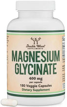 Magnesium glycinate 400 mg supplement bottle with two capsules