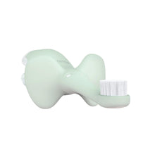 Mint elephant-shaped infant toothbrush with soft bristles, front angled view