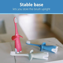 Mint elephant toothbrush with stable base and white bristles, upright view