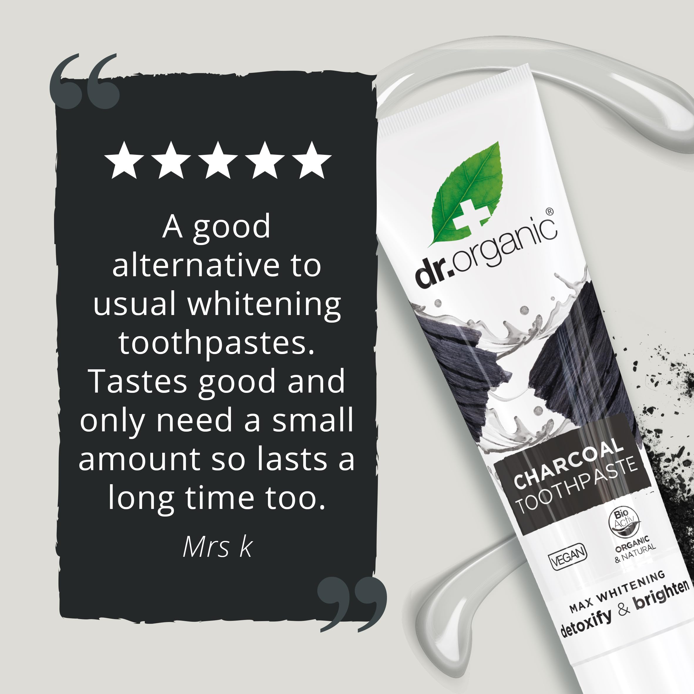 Dr. Organic charcoal toothpaste UAE tube with charcoal smear and five star customer review quote on background