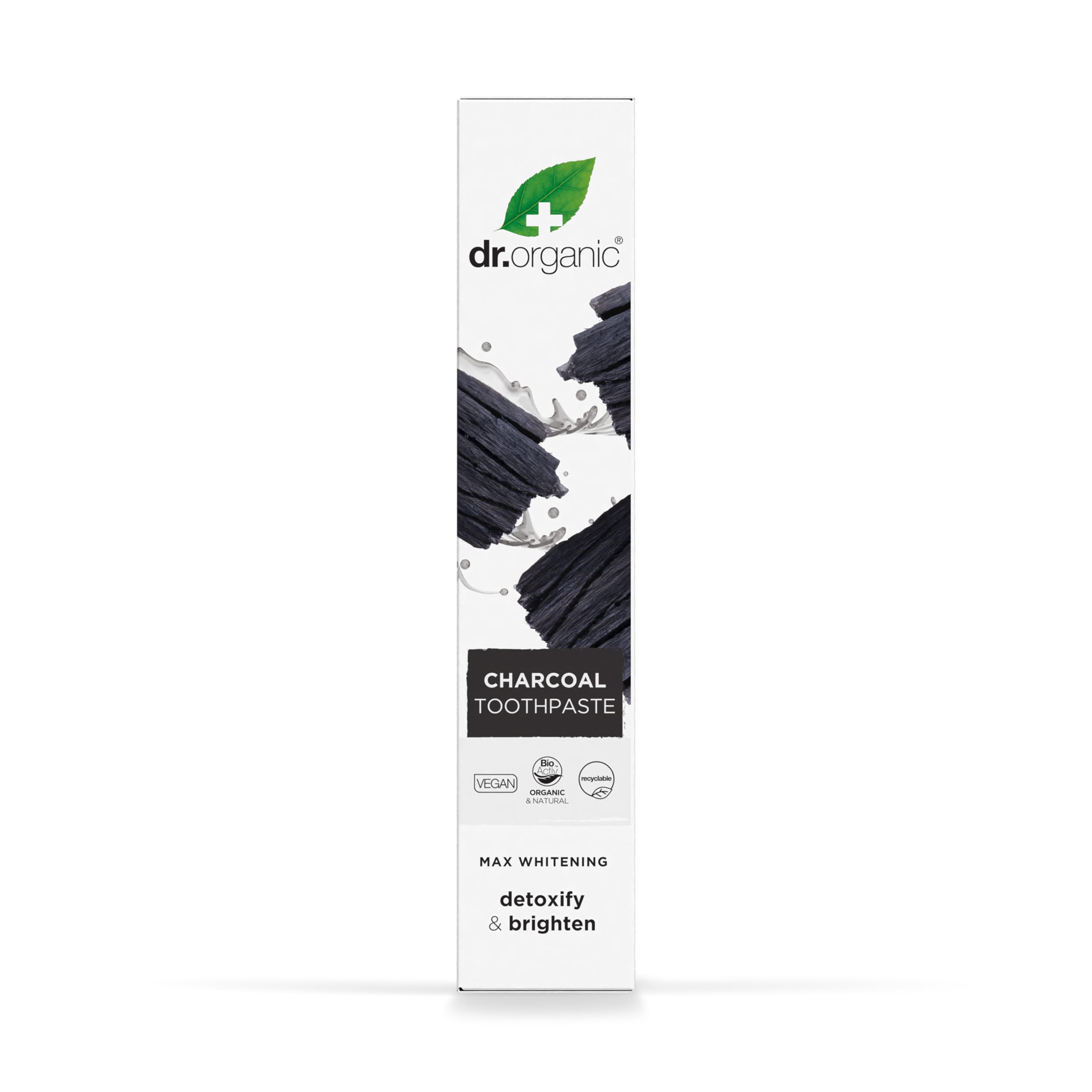Dr. Organic charcoal toothpaste UAE tall white box packaging showing charcoal pieces and detoxify and brighten claims