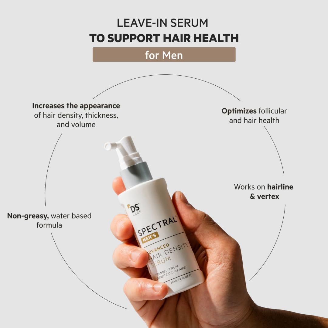Hand holding DS Laboratories Spectral Advanced hair density serum for men with pump dispenser and key benefits text