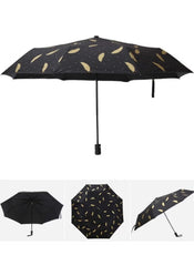 Mumzar black umbrella with gold feather design featuring a dual purpose automatic umbrella mechanism